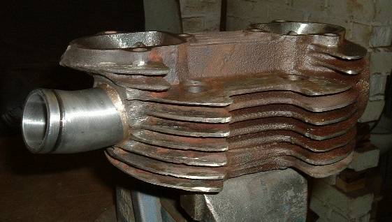 An iron head with a 
	34mm inlet tract